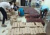 दरभंगा में शराब तस्करी का बड़ा खुलासा, टाइल्स गोदाम से 459 कार्टन विदेशी शराब बरामद